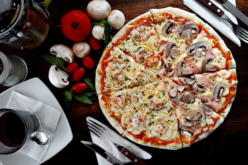 Mushroom Truffle pizza with wild mushrooms and truffle oil