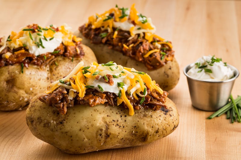 Loaded potato wedges with sour cream and cheese
