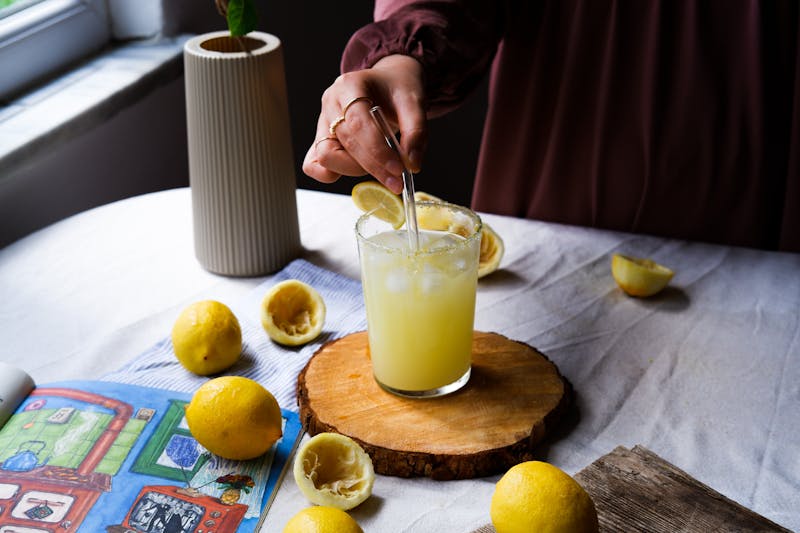 Fresh lemonade drink with lemons and ice