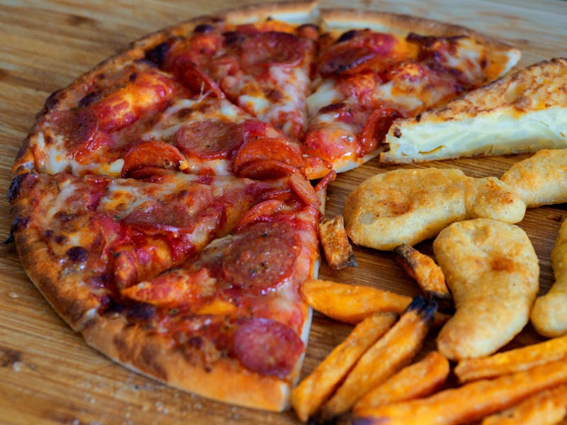 Buffalo Chicken pizza with hot sauce and blue cheese